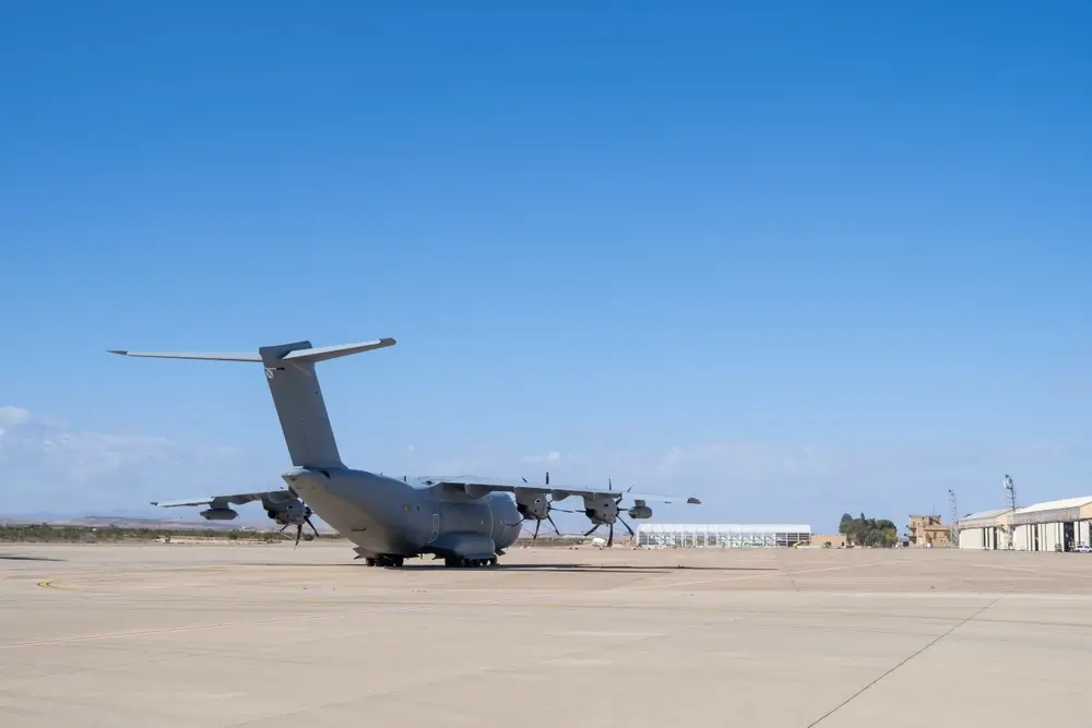 Military cargo plane on a runway, illustrating air force logistics and military aircraft for international deployments.